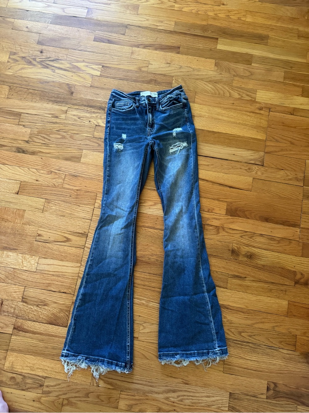 Women's Distressed Dark Blue Flared Jeans
